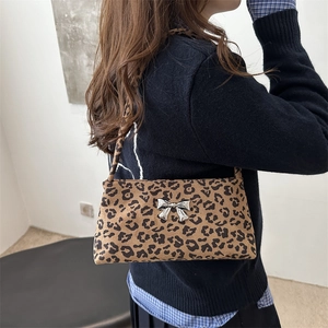 Trendy leopard print baguette underarm bag for women with silver butterfly metal buckle