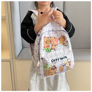 Detail of lavender checkered kids backpack featuring cute cartoon capybara prints and side pocket