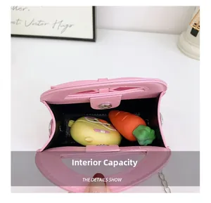 Top view showing the internal capacity of the pink bow handbag for little girls