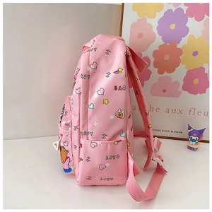 Close-up of pink Capybara school bag featuring side pockets and wide adjustable straps