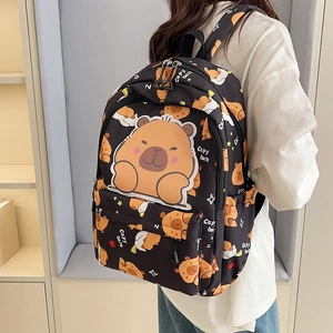 Black backpack featuring cute capybara cartoon prints and spacious main compartment