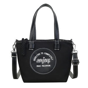 Sac fourre-tout en toile noire avec coutures contrastées et bandoulière réglable femme