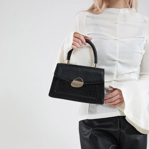 Minimalist black leather handbag with crocodile pattern and golden metal buckle for women