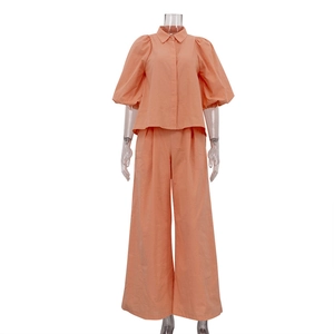 Lässiges Damen-Set in Orange-Rosa mit Puffärmel-Hemd und weiter Hose, zweiteilig