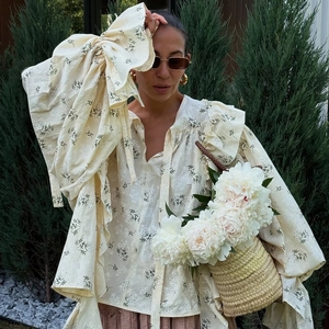 French style floral ruffle blouse with tie-neck and bell sleeves in cream white