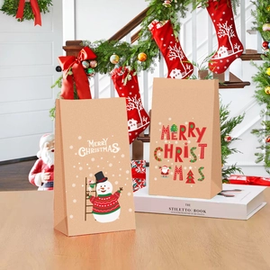 Sachets cadeaux de Noël en papier kraft avec bonhomme de neige et lettrage de fête