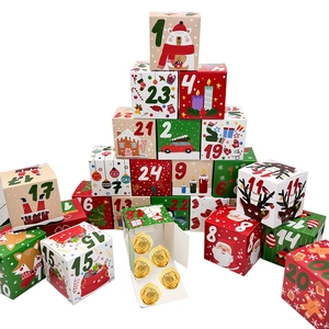 Detail of 24 Christmas advent calendar boxes with festive illustrations and numbered designs