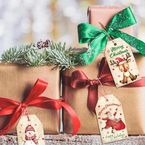 Vintage Kraft paper Christmas gift tags with snowman and reindeer illustrations