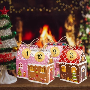 Rosa und braune Lebkuchenhaus-Weihnachtsboxen mit nummerierten Countdown-Anhängern