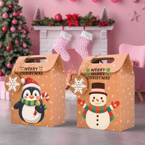 Close-up of Christmas kraft paper gift bags with penguin and snowman designs and snowflake tags