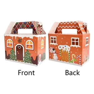 Front and back detail of gingerbread house Christmas paper gift bags with handles