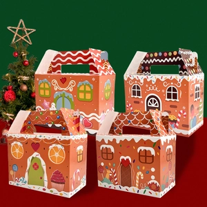Christmas gingerbread house paper gift boxes with festive snow patterns and handles
