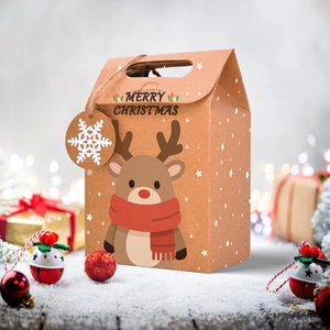 Close-up of brown kraft paper Christmas gift bag featuring a cute reindeer and snowflake tag