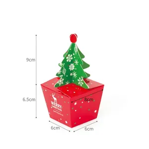 Christmas tree shaped paper gift box with reindeer patterns and Merry Christmas text