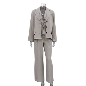 Three-piece light grey suit set with lapel blazer, lace-up vest, and wide-leg pants