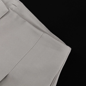 Detailed view of high-density twill fabric stitching and seam finish for women suits