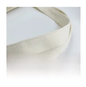 Detail of durable heavy-duty canvas tote shoulder strap with reinforced double stitching
