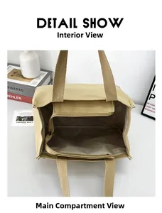Detail show of spacious khaki canvas tote bag interior with a metal zipper inner pocket