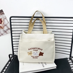 Sac fourre-tout en toile blanc cassé avec broderie ours et poignées en toile de jute kaki