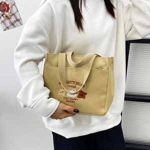 Minimalistische beige Segeltuch-Einkaufstasche mit Bärenstickerei und großem Fassungsvermögen