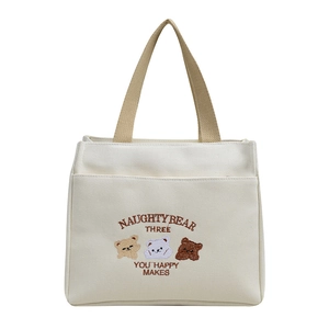 Minimalist canvas lunch bag with cartoon bear embroidery and khaki woven handles