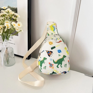 Cartoon dinosaur and rocket print kids chest bag with adjustable cream fabric strap