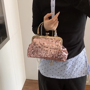 Chic rose gold sequin evening bag with round metallic handle and chain shoulder strap
