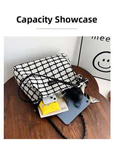 Spacious black and white plaid tote bag showing inner storage for iPad and essentials