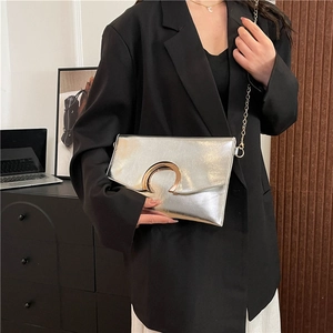 Silver envelope clutch bag for women with gold C-buckle and metal chain strap