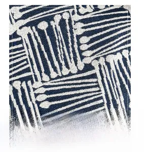 Close-up of blue and white geometric woven fabric texture on a large tote bag