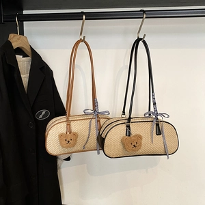 Woven underarm bowling bag for women with cute bear pendant and ribbon detail