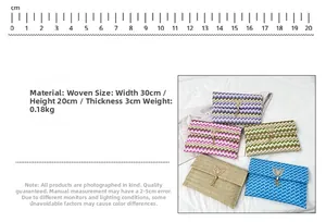 Detailed view of woven envelope clutch with dimensions 30x20x3cm and tassel detail