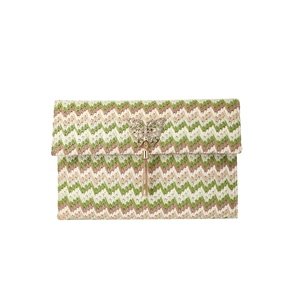 Straw envelope clutch with wave weave, gold butterfly buckle and tassel fringe