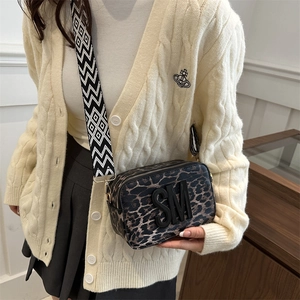 Chic leopard print crossbody camera bag with black SM letter and geometric wide strap