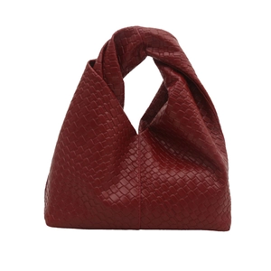 Retro burgundy woven leather tote bag with signature knotted handle and triangular structure