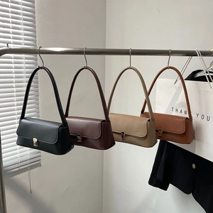 Elegant women's crossbody bags in black brown khaki and tan leather with gold metal buckle