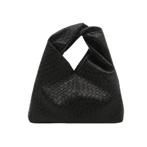 Minimalist black woven leather tote bag with a unique knot handle and triangle shape