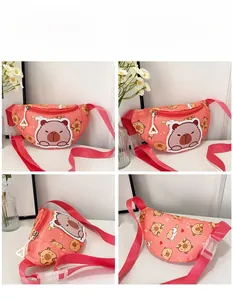 Detail view of pink capybara pattern kids chest bag with adjustable strap and buckle