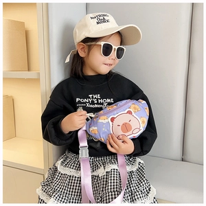 Kids purple cartoon chest bag with adjustable strap worn by a young child model