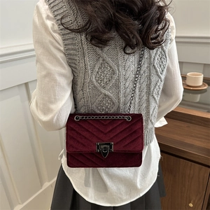 Retro burgundy velvet crossbody bag with chain strap and elegant wave quilting for women