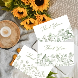 Close-up of Thank You card with vintage botanical flowers and bird illustrations