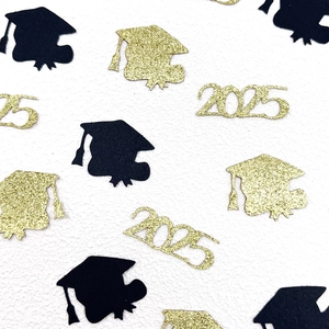 Black and gold 2025 graduation party confetti with glitter doctoral cap shapes for tables
