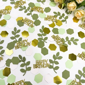 Green and gold hexagon party confetti with Happy Birthday letters and leaf cutouts