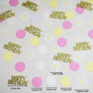 Gold glitter Happy Birthday confetti with daisy flower petals and round paper circles