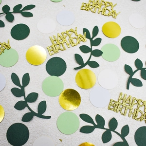 Colorful Happy Birthday and leaf confetti set for party table decoration on white background