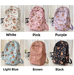 Grid view of six cute cartoon bear backpacks in various colors with front zipper pockets
