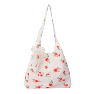 Floral print canvas tote bag with red roses and decorative white lace bow