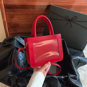 Chic red square handbag with clear PVC window for display and adjustable strap