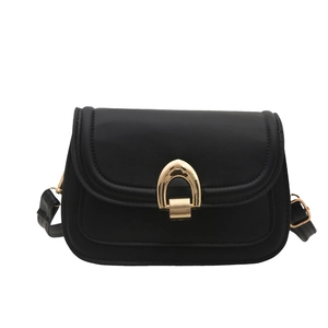 Minimalist black flap crossbody bag with vintage gold horseshoe buckle and adjustable strap