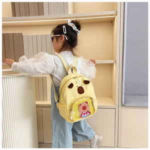 Zainetto per bambini in tela gialla con ricamo di animali e tasca a rete